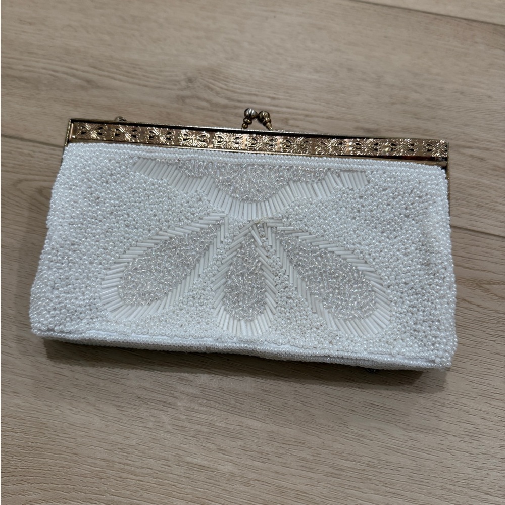 Vintage hand beaded white clutch. Perfect for bridal events.